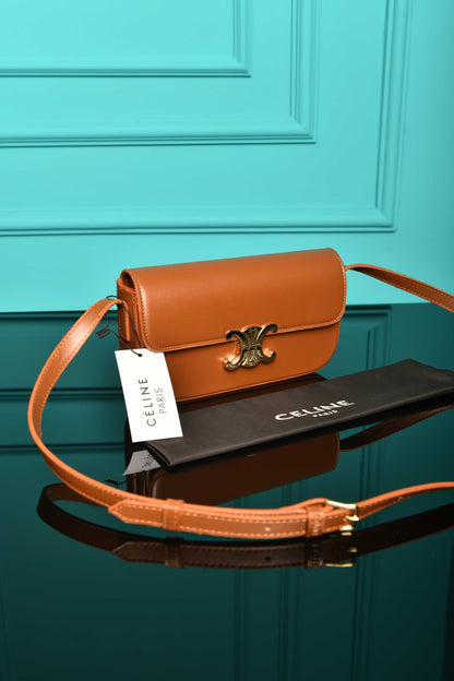 Triomphe Schultertasche aus glänzendem
